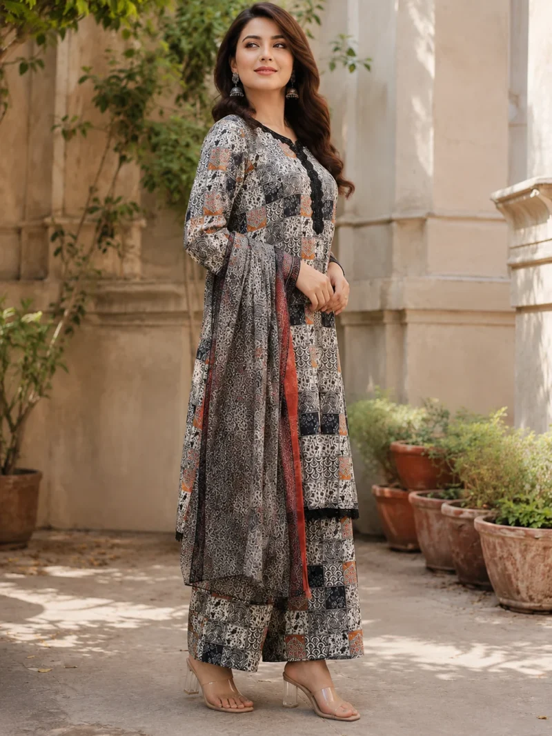 Black printed lawn suit with matching printed trouser and crepe dupatta for women by AR Pehnawa