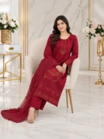 Maroon 3 piece stitched dorya lawn suit with matching trouser and coordinated dupatta sitting