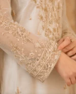 Off white 3 piece organza suit with gold-toned front work, palazzo and matching dupatta