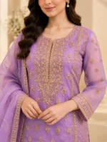 Embroidered organza dress neckline detail with golden embroidery in purple